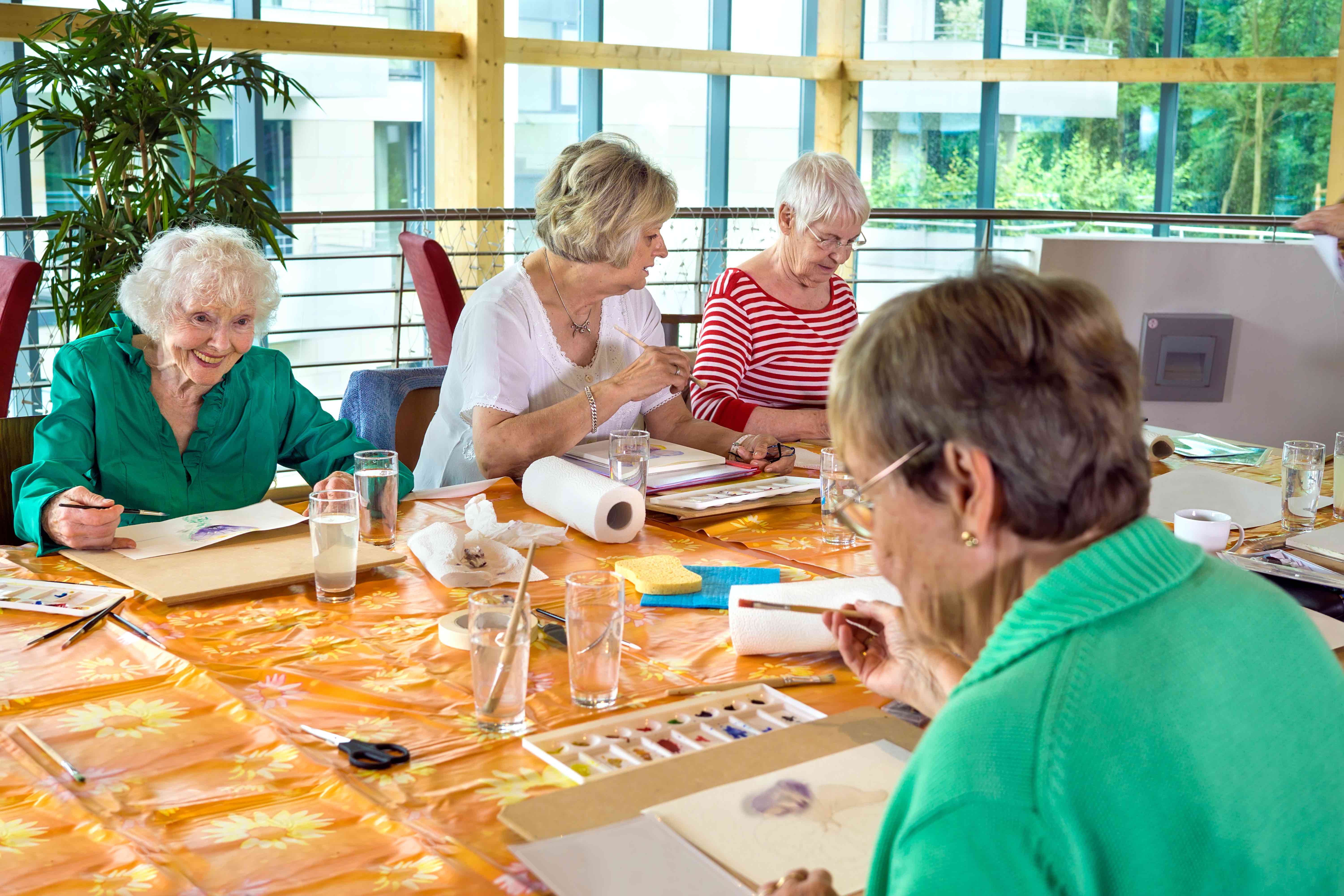 Older women using watercolors 